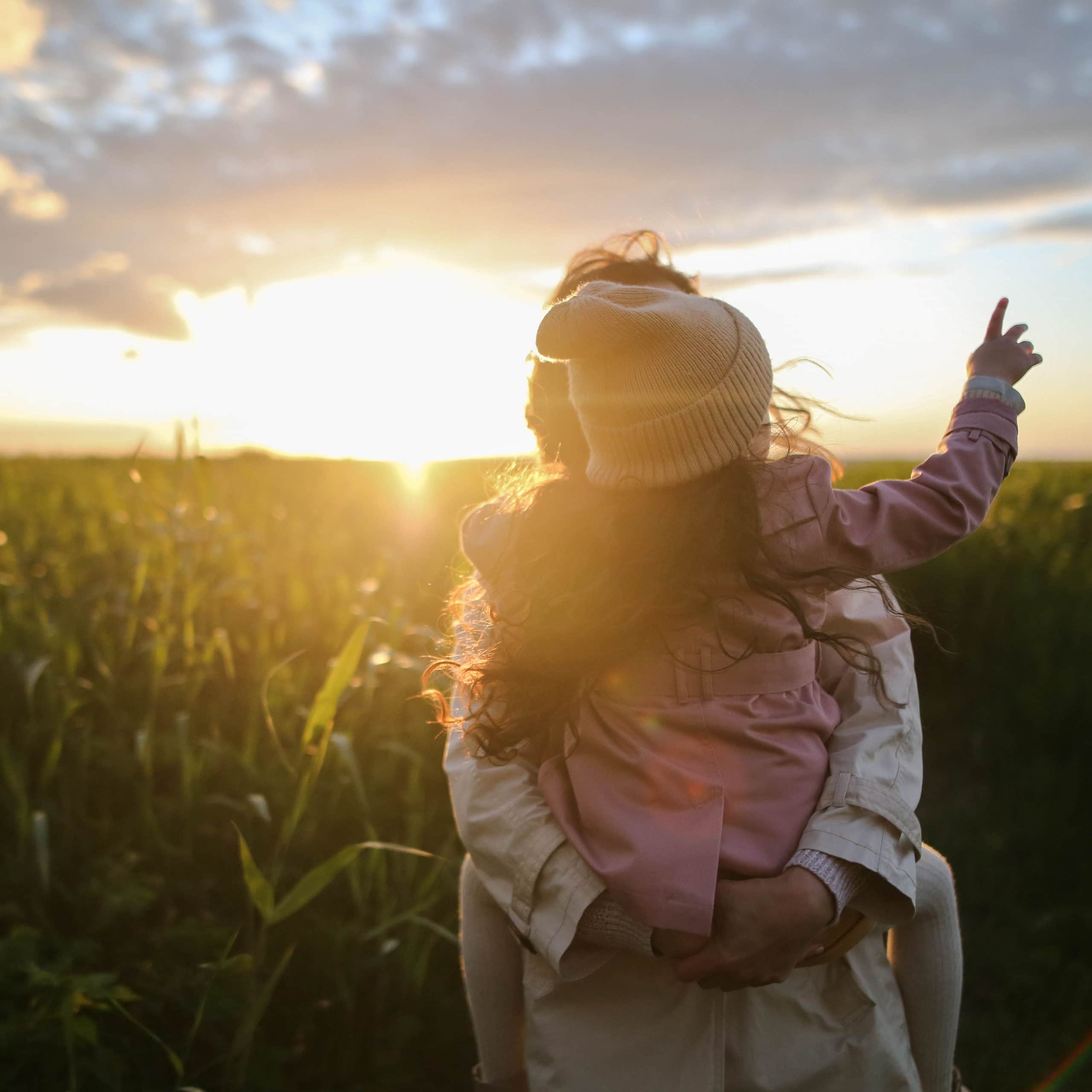 Child pointing to the sky